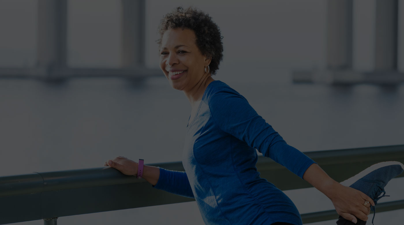 older woman working out after knee surgery